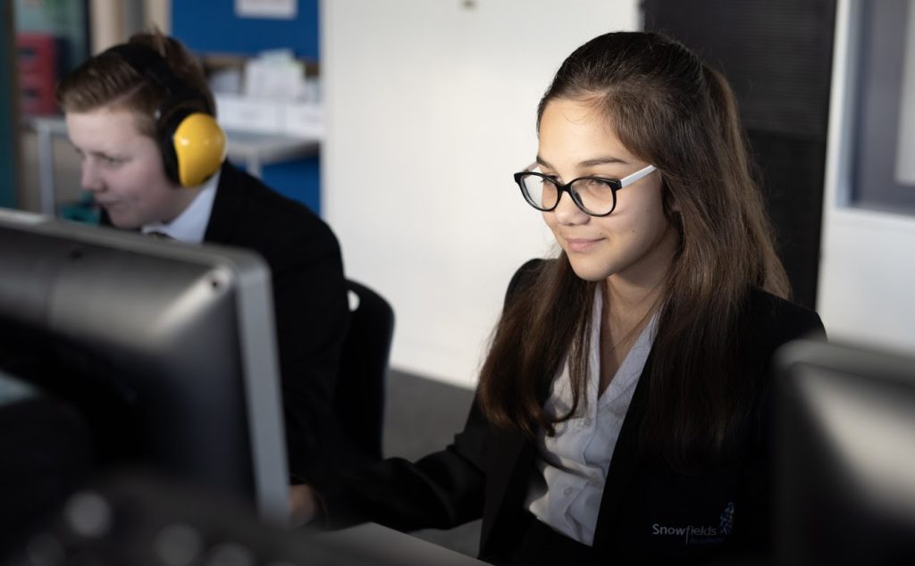 Female student using a computer