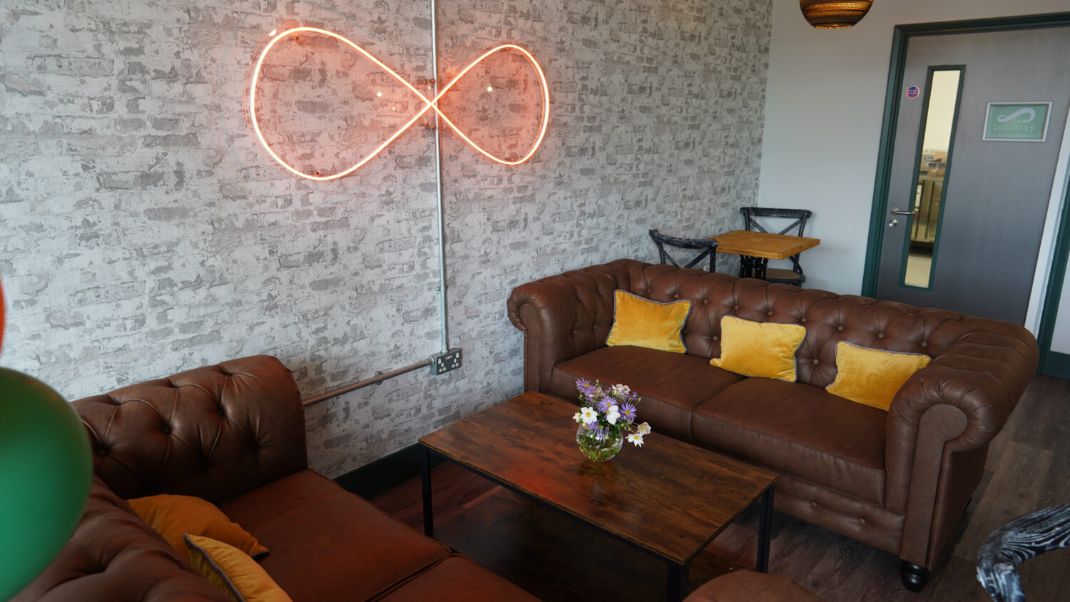 Interior photo of a seating area in the Infinity Cafe at Leigh Academy Snowfields.