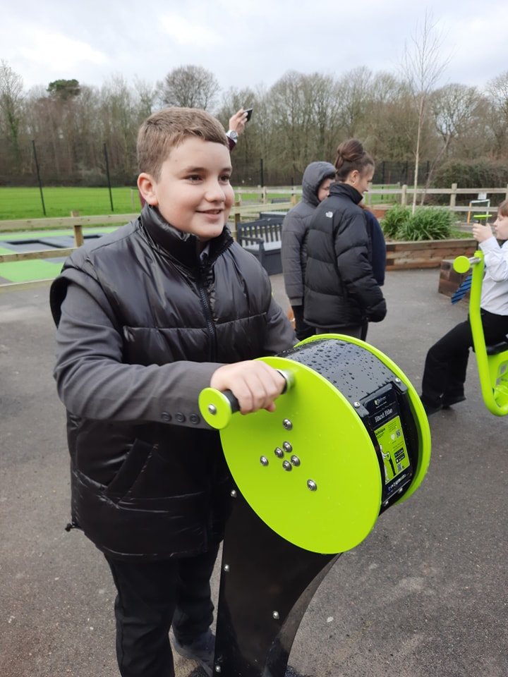 A photo showing some students using the apparatus in the new outdoor Gym on the academy grounds.